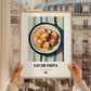 Leche Frita – on Striped Tablecloth, Spanish Dessert Wall Decor, styled in a charming Paris street view