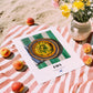 Fava – on Striped Tablecloth, Greek Food Wall Decor, unframed on coastal sand