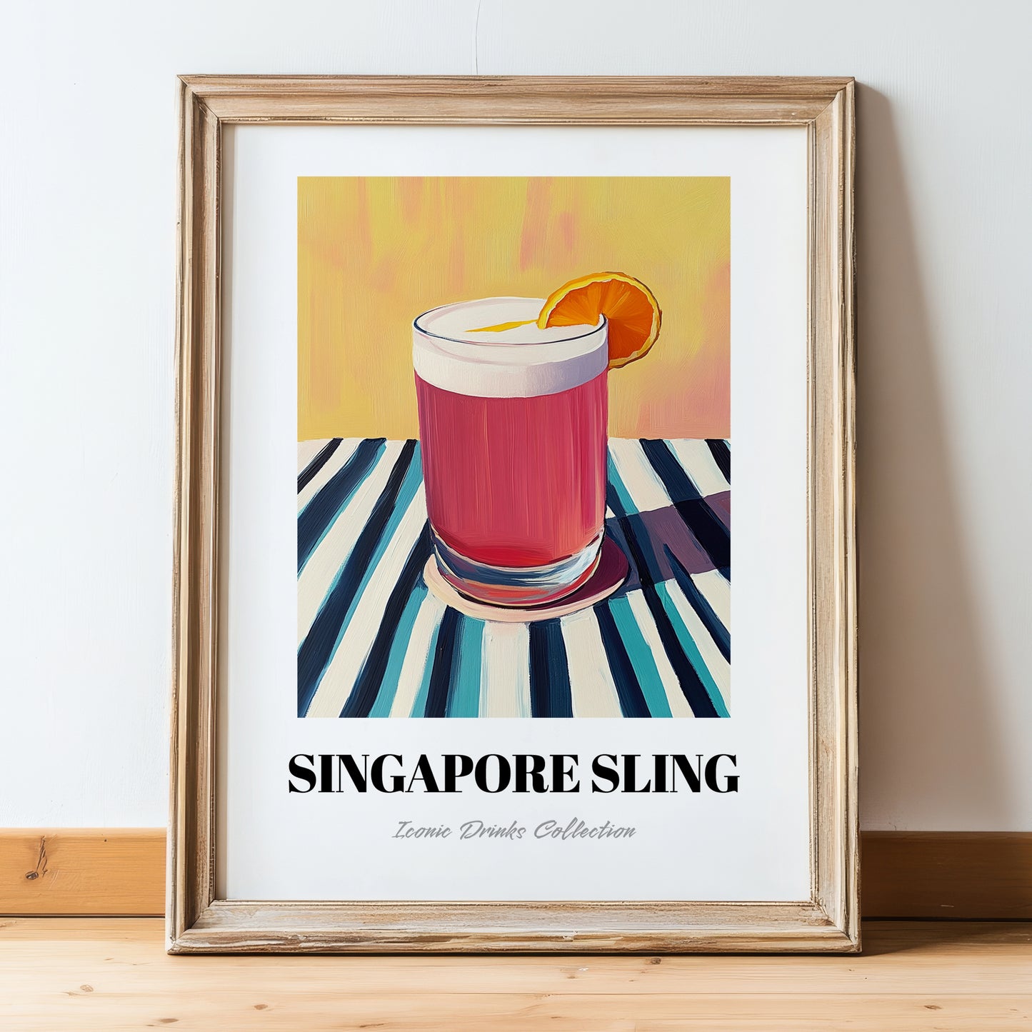 Singapore Sling – on Striped Tablecloth, Singaporean Cocktail Wall Poster, in wooden frame leaning on the floor