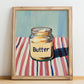 Butter – on Striped Tablecloth, Dry Goods Painting, no-text version framed in wood