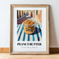 Peanut Butter – on Striped Tablecloth, Pantry Painting, in wooden frame leaning on the floor