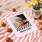 Brown Rice – on Striped Tablecloth, Larder Wall Decor, unframed on coastal sand