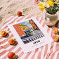 Spam – Italian Urban Café Scene, Canned Food Poster, unframed on coastal sand