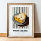 Swiss – on Striped Tablecloth, Cheese Wall Painting, in wooden frame leaning on the floor
