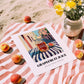 Grapefruit Juice – Italian Urban Café Scene, Lemonade Illustration, unframed on coastal sand