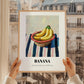 Banana – on Striped Tablecloth, Fruit Wall Decor, styled in a charming Paris street view