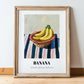 Banana – on Striped Tablecloth, Fruit Wall Decor, in wooden frame leaning on the floor