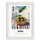 Kiwi – White village Outdoor Café Scene, Fruit Wall Art, placed in minimal white frame