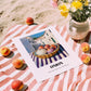 Onion – White village Street Café Scene, Vegetable Wall Illustration, unframed on coastal sand