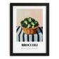Broccoli – on Striped Tablecloth, Vegetable Still Life, in sleek black frame