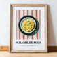 Scrambled Eggs – on Striped Tablecloth, American Food Poster, in wooden frame leaning on the floor