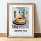 Cheesecake – White village Outdoor Café Scene, American Dessert Poster, in wooden frame leaning on the floor