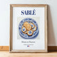 Sablé – French Dessert Dish, Bistro Wall Art, in wooden frame leaning on the floor