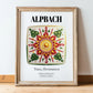Alpbach, Austria – Travel Poster, in wooden frame leaning on the floor